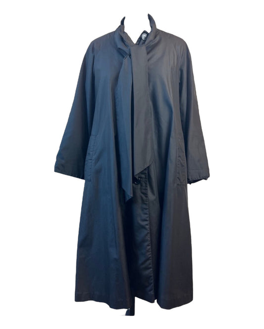 1960s Singing Opera in the Rain Coat